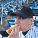 Geoff-Welch-Eating-Hot-Dog-Yankee-Stadium Geoff Welch eating a hot dog at Yankee Stadium