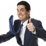 Confident Man in a Suit Giving Two Thumbs Up
