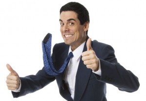 Confident Man in a Suit Giving Two Thumbs Up